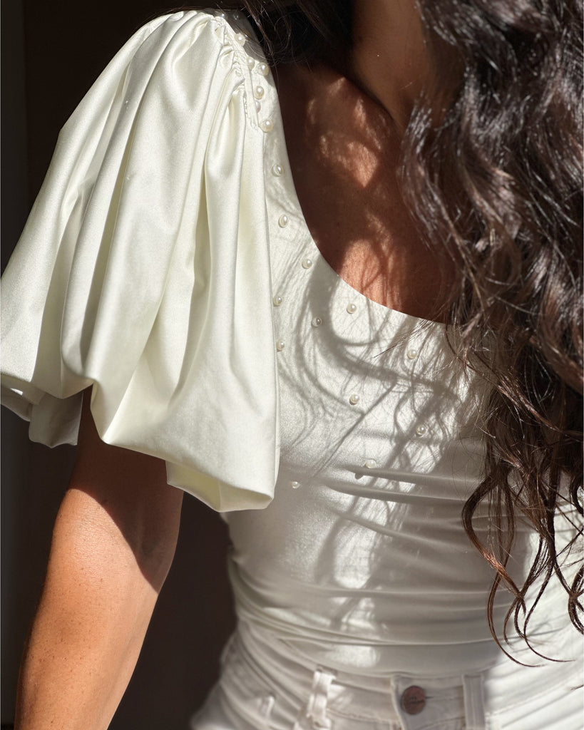 Top Manuela White